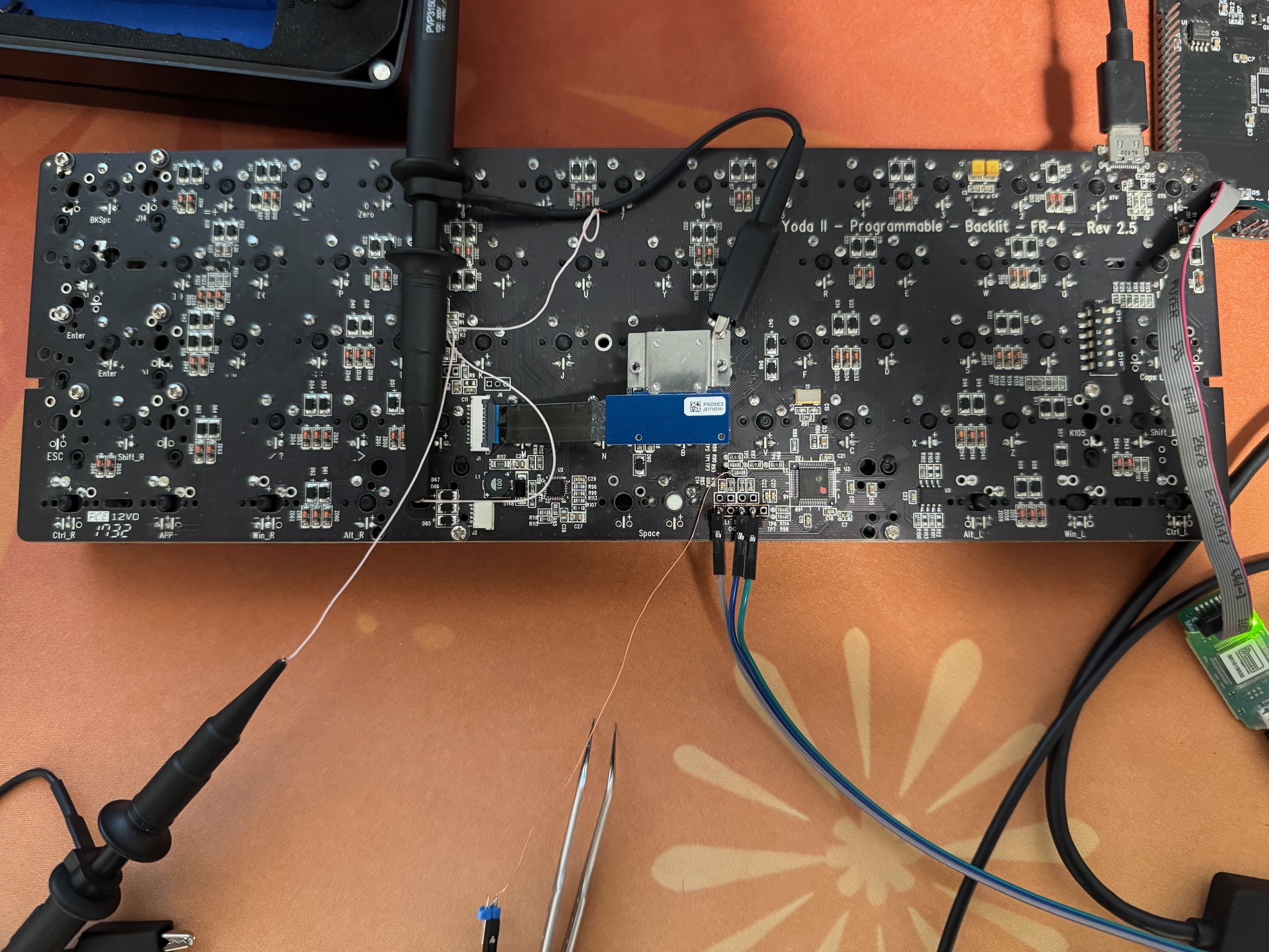 Keyboard with &ldquo;debug&rdquo; wires attached